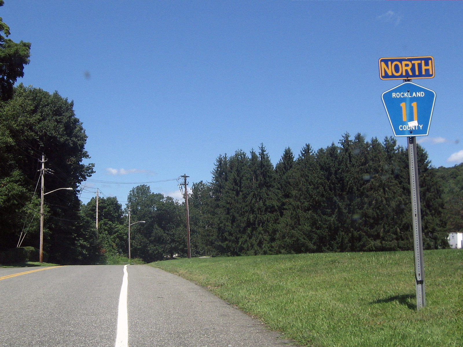 A Rockland County Route 11 North road sign in Orangeburg, New York