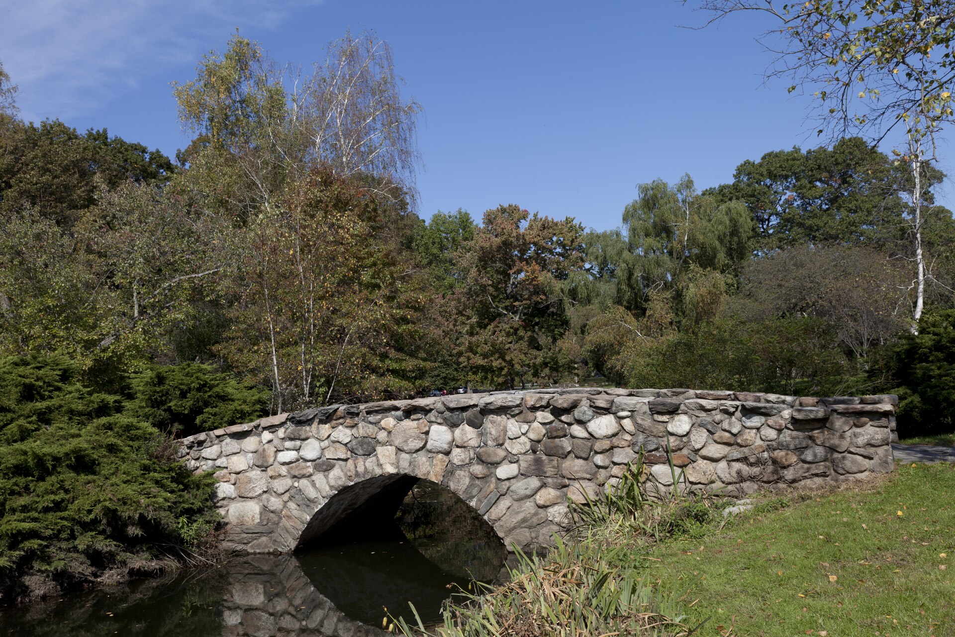 A stone bridge over a pond in Binney Park, Riverside, Connecticut.