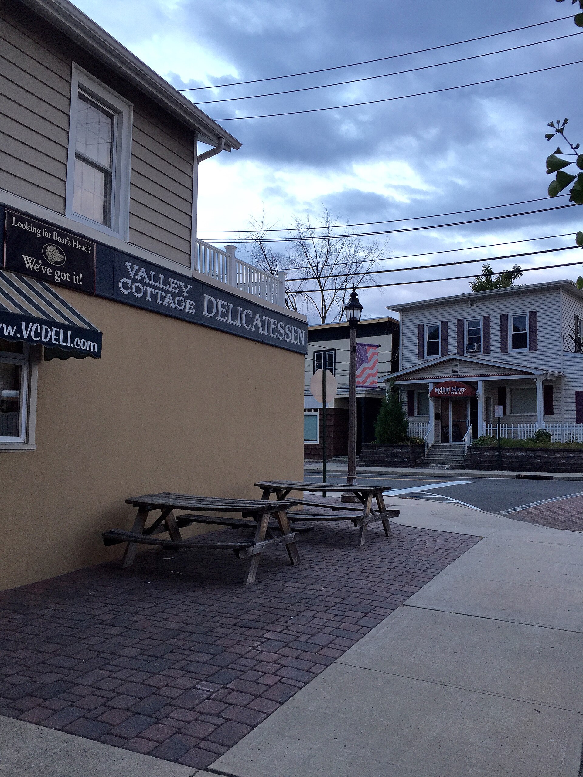 A corner delicatessen storefront, the Valley Cottage Delicatessen, in Valley Cottage, New York.