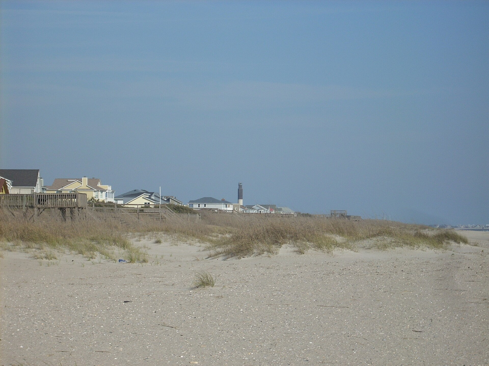 Caswell Beach, North Carolina, with the Oak Island Lighthouse in the distance
