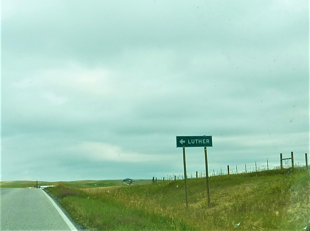 A road sign pointing toward Luther on Montana Highway 78