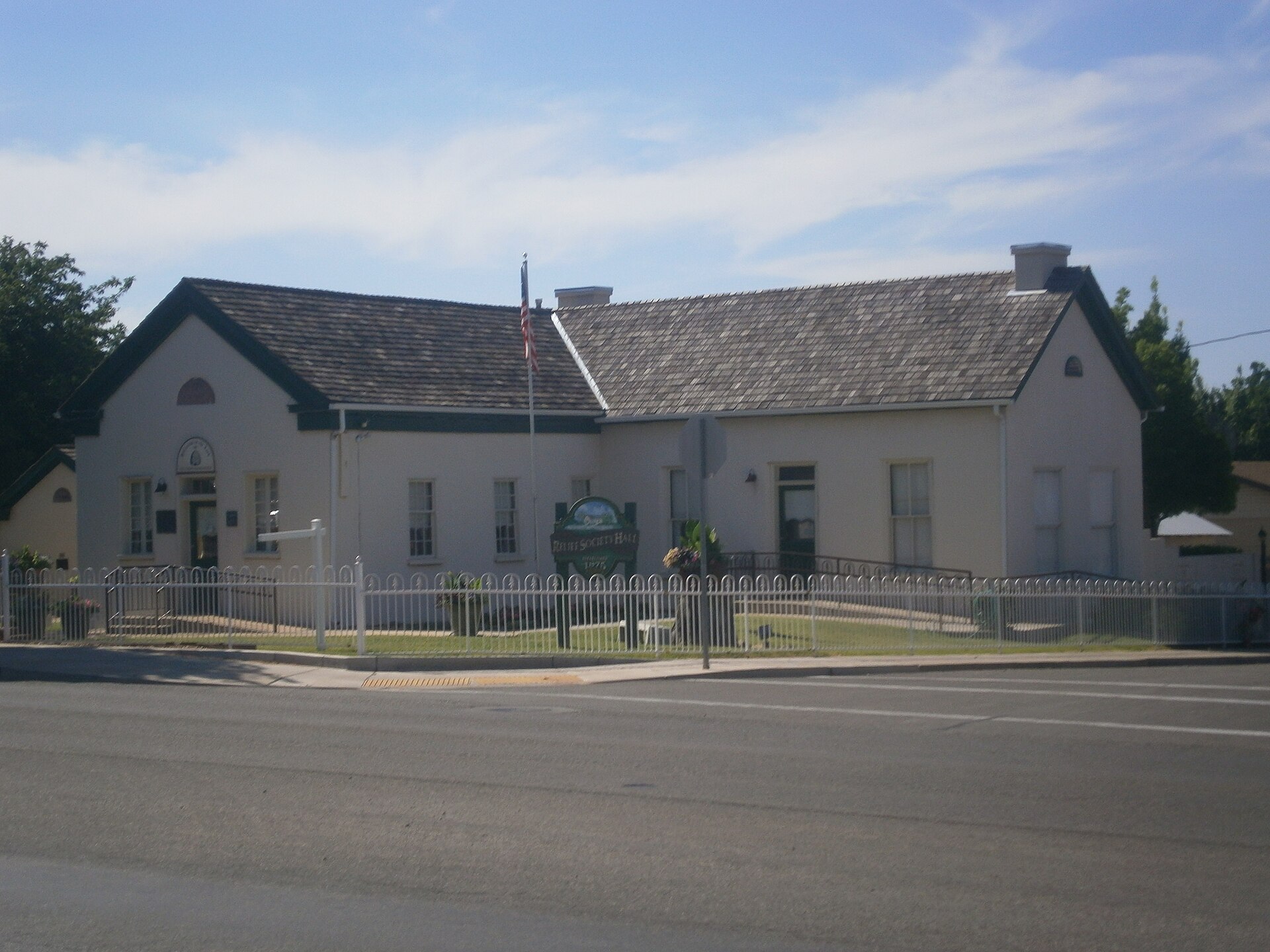 The historic Washington Relief Society Hall, a white pioneer-era building in Washington, Utah.
