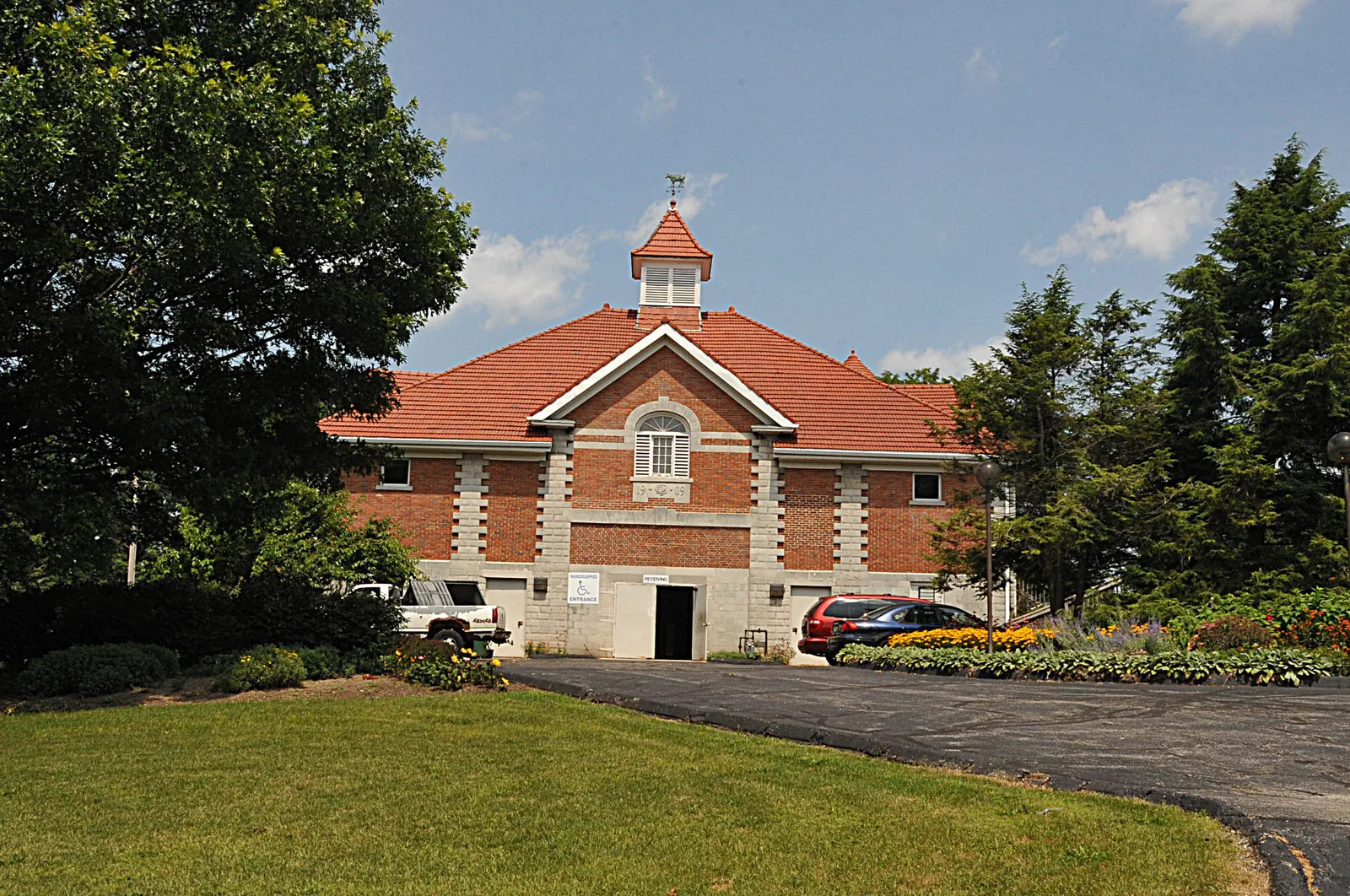 O.C. BARBER, THE MATCH KING DEVELOPED AN AGRICULTURAL COMPLEX IN BARBERTON STARTING AROUND 1900 AND LASTING UNTIL 1913.   102 STRUCTURES WERE BUILT BUT MOST HAVE SINCE BEEN DEMOLISHED.  THIS IS A END VIEW OF THE FIRST BARN BUILT WHICH IS NOW USED BY YODER COMPANY; THE FARM WAS NAMED FOR HIS DAUGHTER