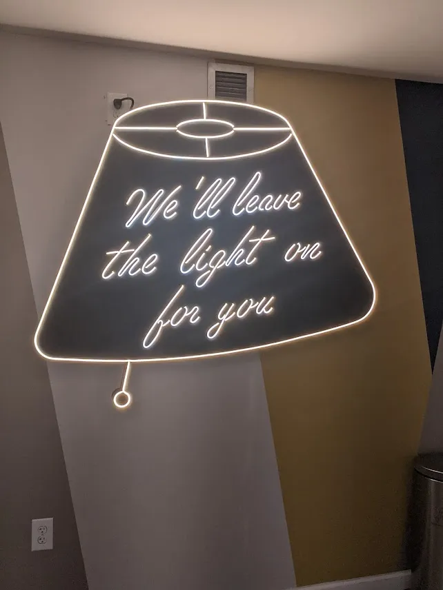 Motel 6 lobby sign -- "We'll leave the light on for you" -- in Streetsboro, Ohio.