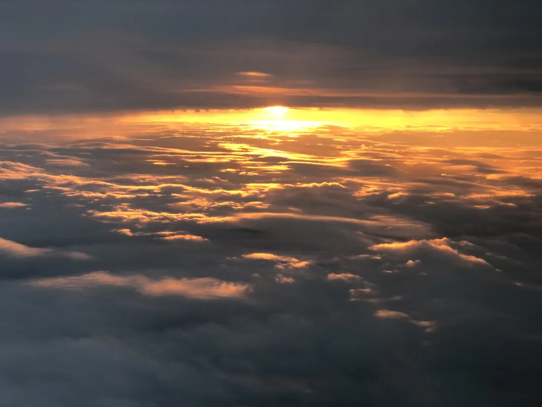 View of sunset over Penn Forest Township, Carbon County, Pennsylvania, viewed from an airplane heading for Newark Liberty International Airport
