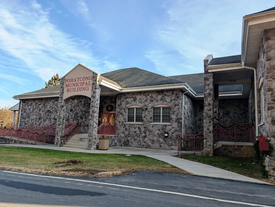 Photo of the Pohatcong Township, New Jersey Municipal Building. Photo taken from County Route 636 (Municipal Drive) looking south-southeast.