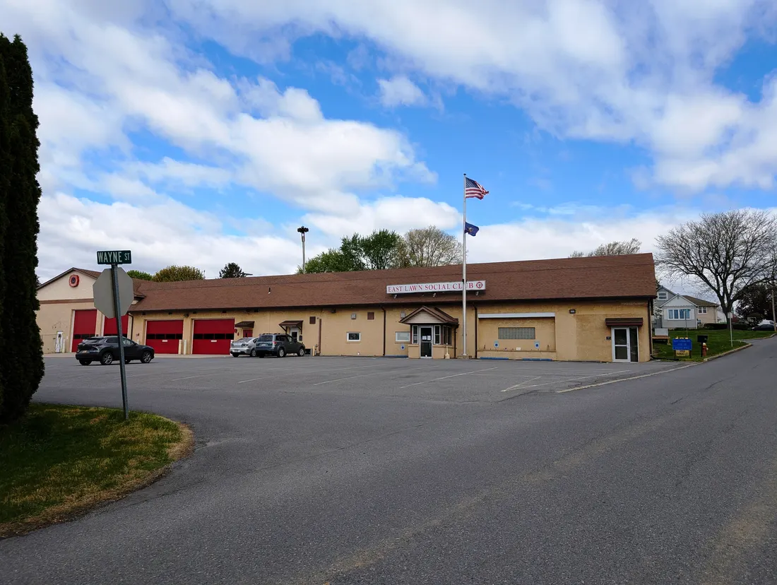 Photo of the East Lawn Fire Department and Social Club in the village of East Lawn within Upper Nazareth Township, Pennsylvania. Photo taken from Newport Avenue at Wayne Alley looking north-northwest.