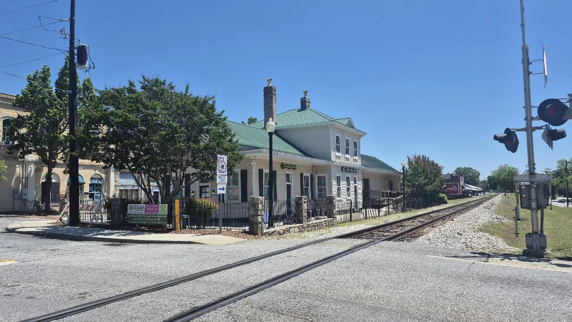 The former Georgia Railroad depot in Conyers, Georgia. Built in 1891, it is now used as a welcome center for the town. — License: