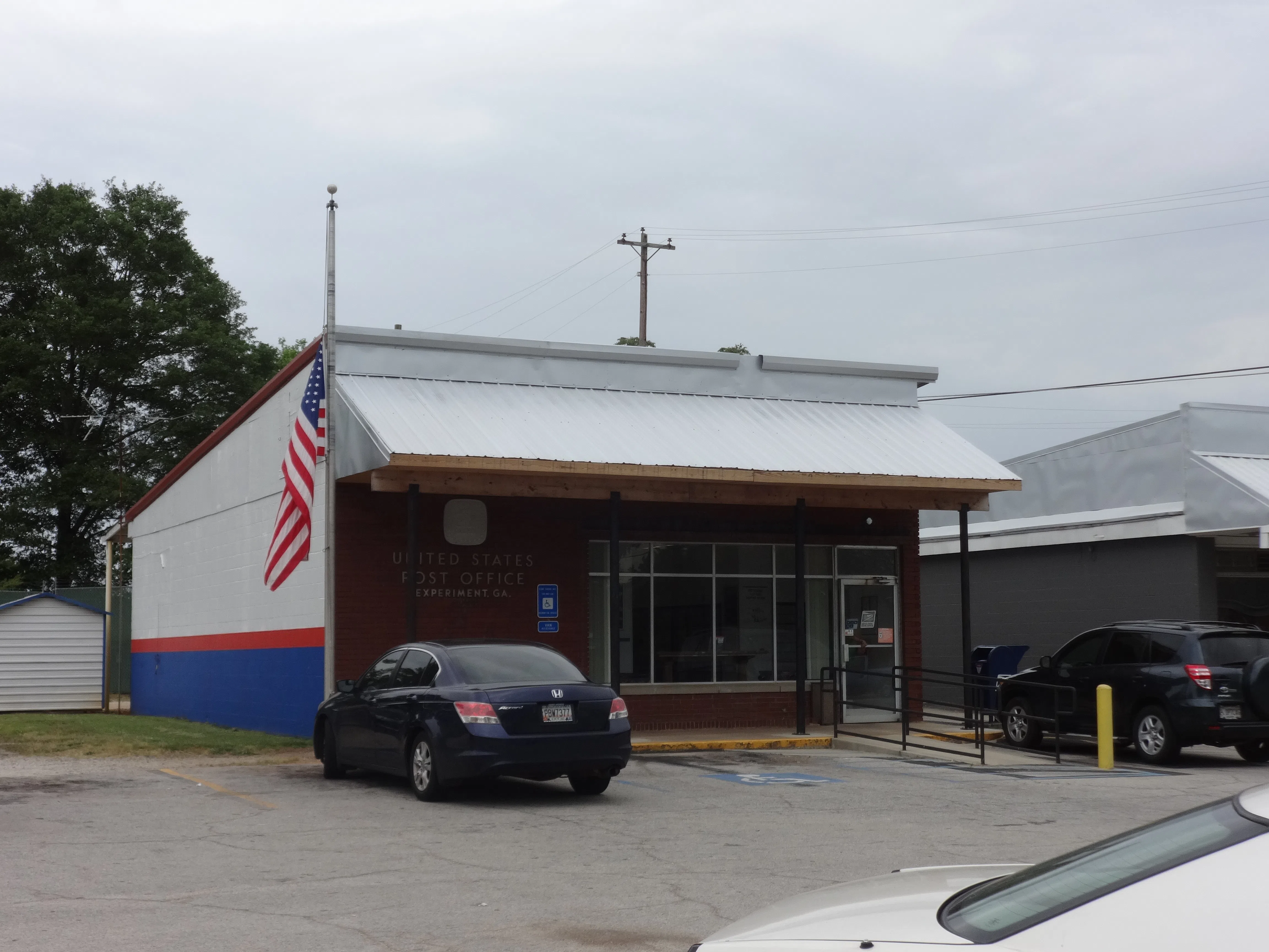 Experiment post office, Experiment, Spalding County, Georgia. Flag was half staff because of Peace Officers' Memorial Day — License: