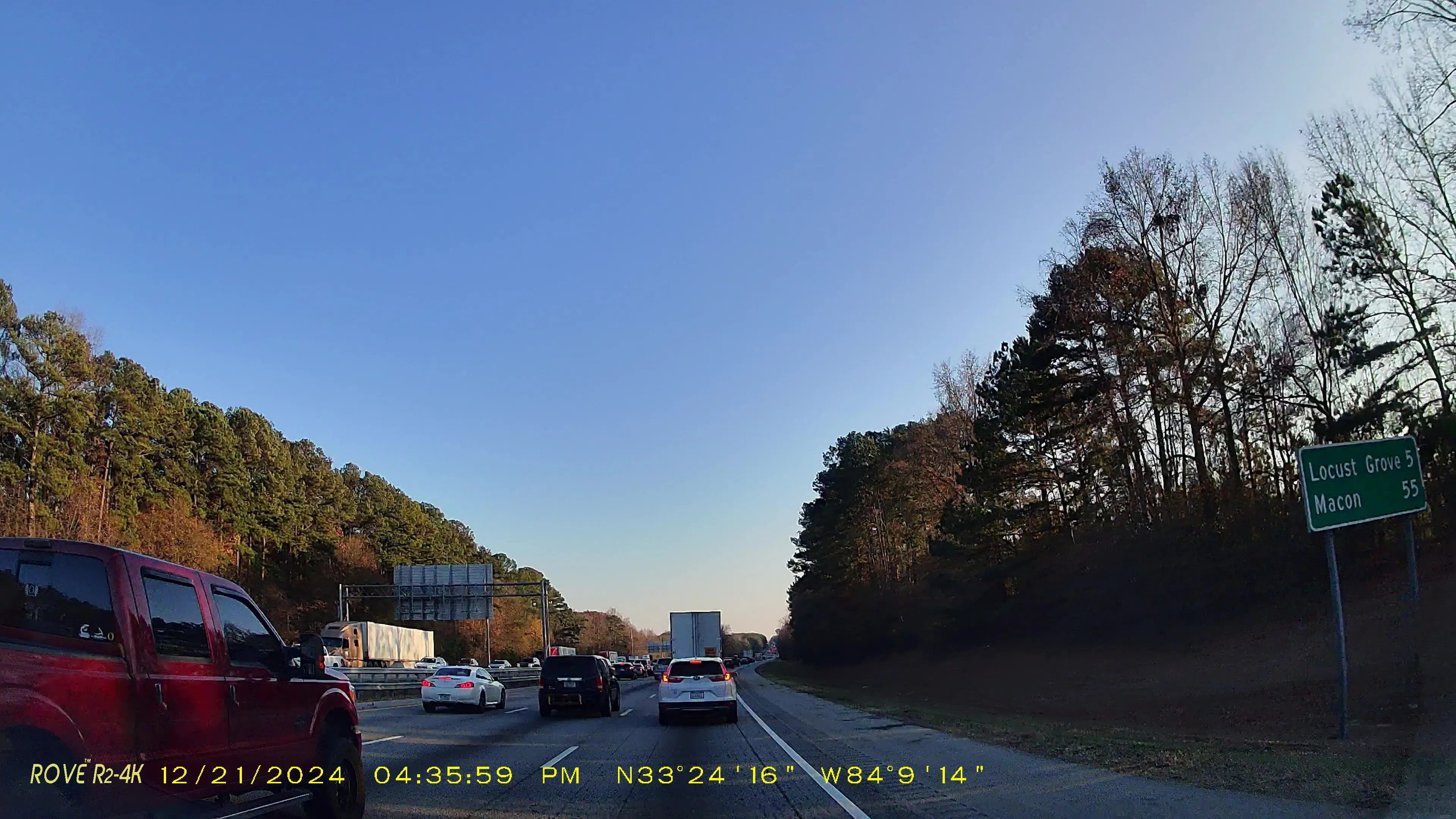 I-75 distance sign showing Locust Grove