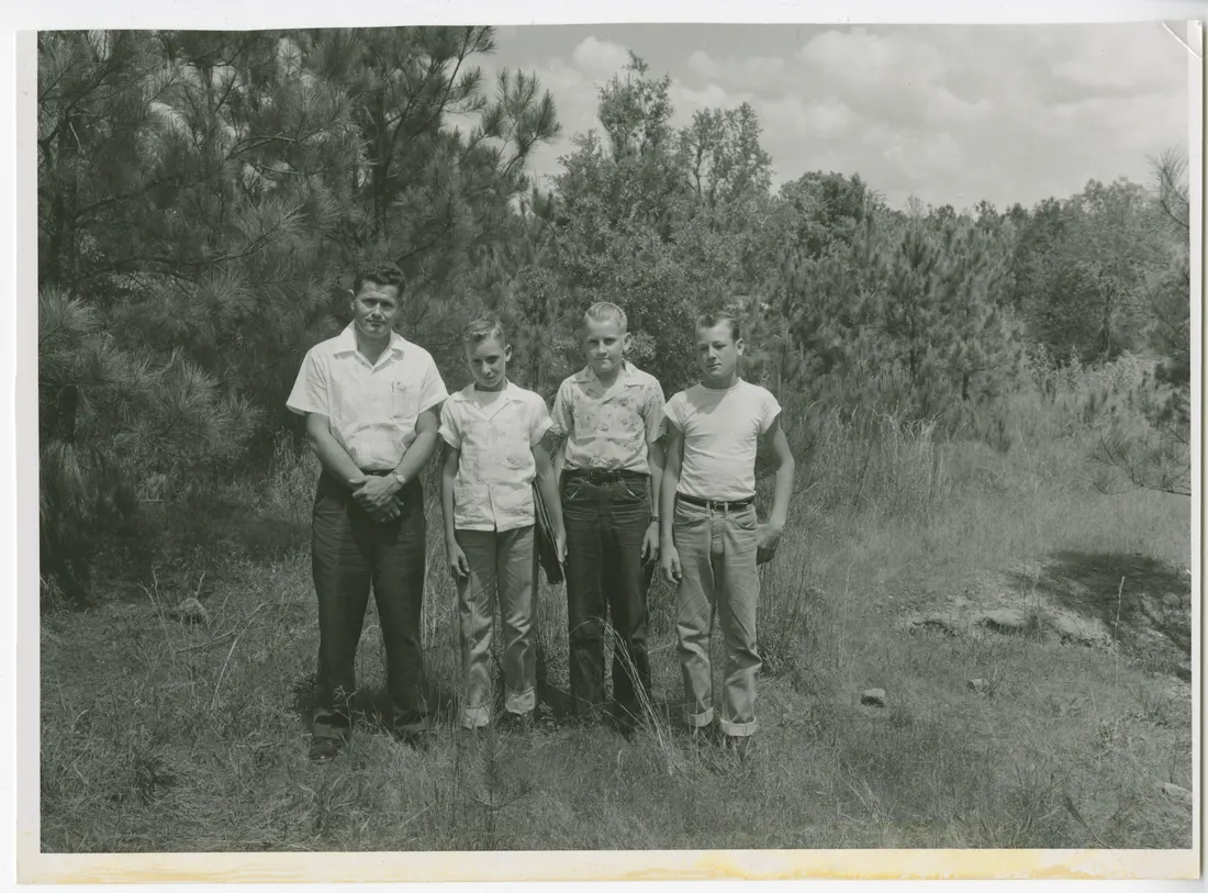 Harlem High School participants in the Little River Soil Conservation District land judging contest. Pictured are Whitfield Young, high school teacher, Jerry Williams and Eulon Purvis and Wallace, second place winners. P