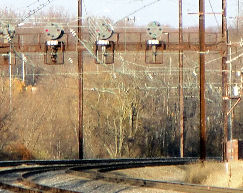 View of position color light signals on Amtrak Northeast Corridor north of Aberdeen, Maryland station. Signals were converted from PRR position lights (single-color).
