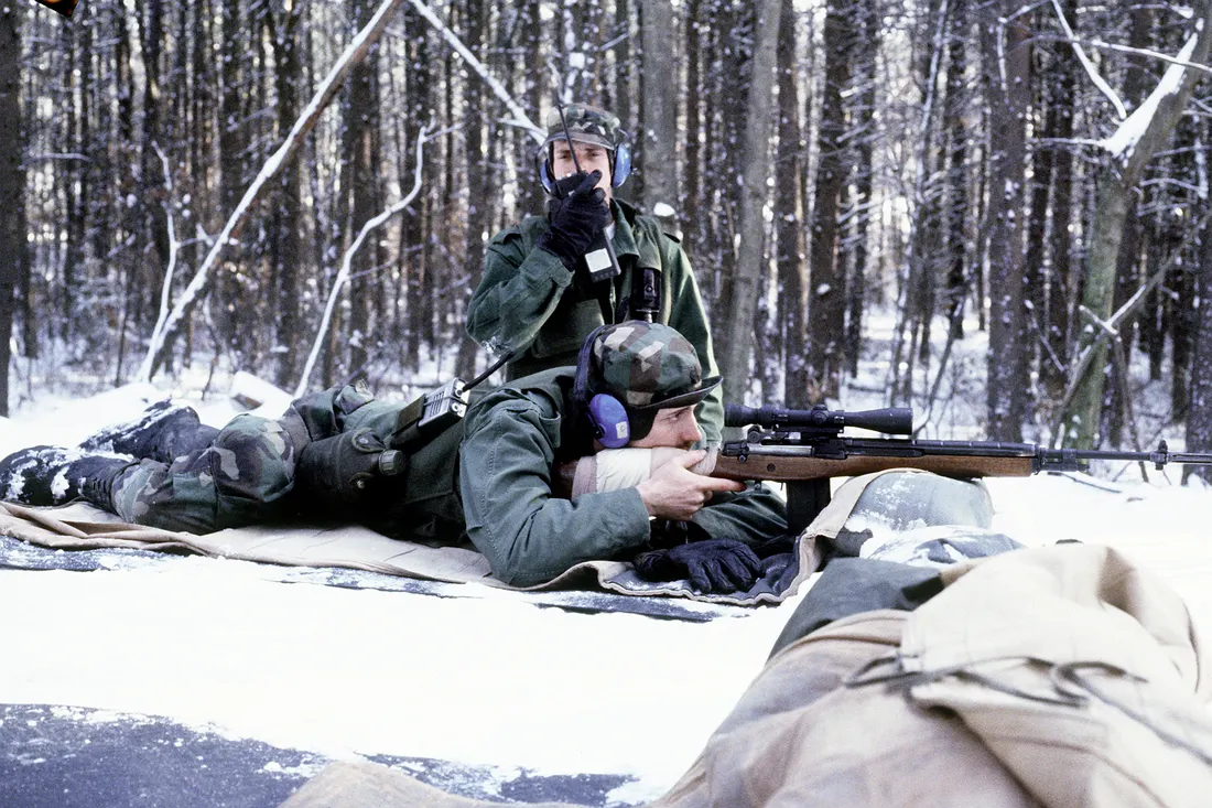 Members of the 519th Military Police Battalion fire the M-14 sniper rifle on Range 9. They are taking their annual qualification tests prior to the execution of exercise Orbit Sunset, an exercise designed to test the ba