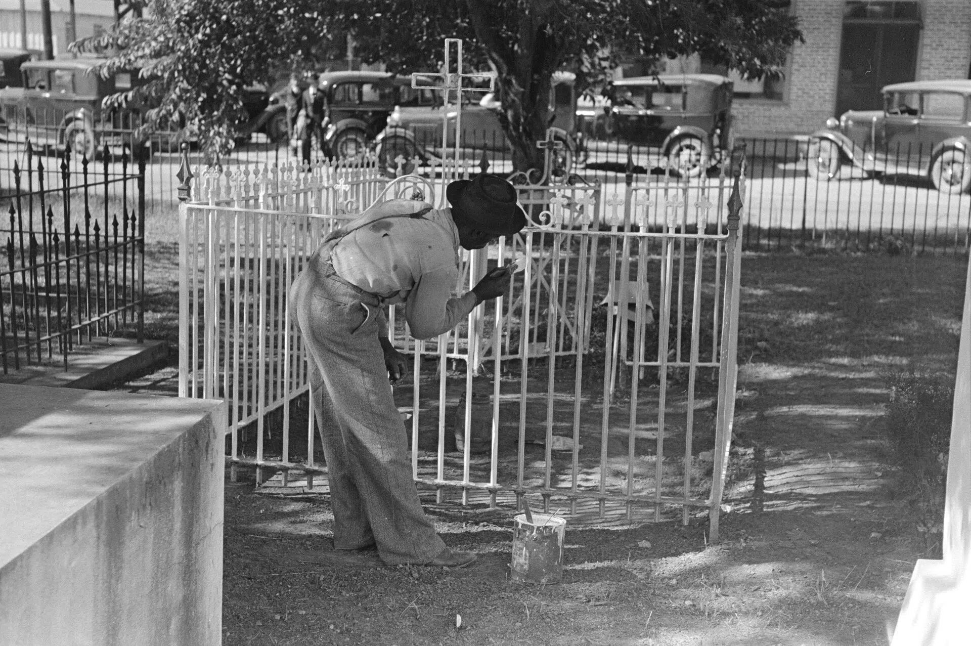 "On All Saints' Day it is customary in Louisiana for fences to be painted and whitewashed. New Roads, Louisiana" 1938