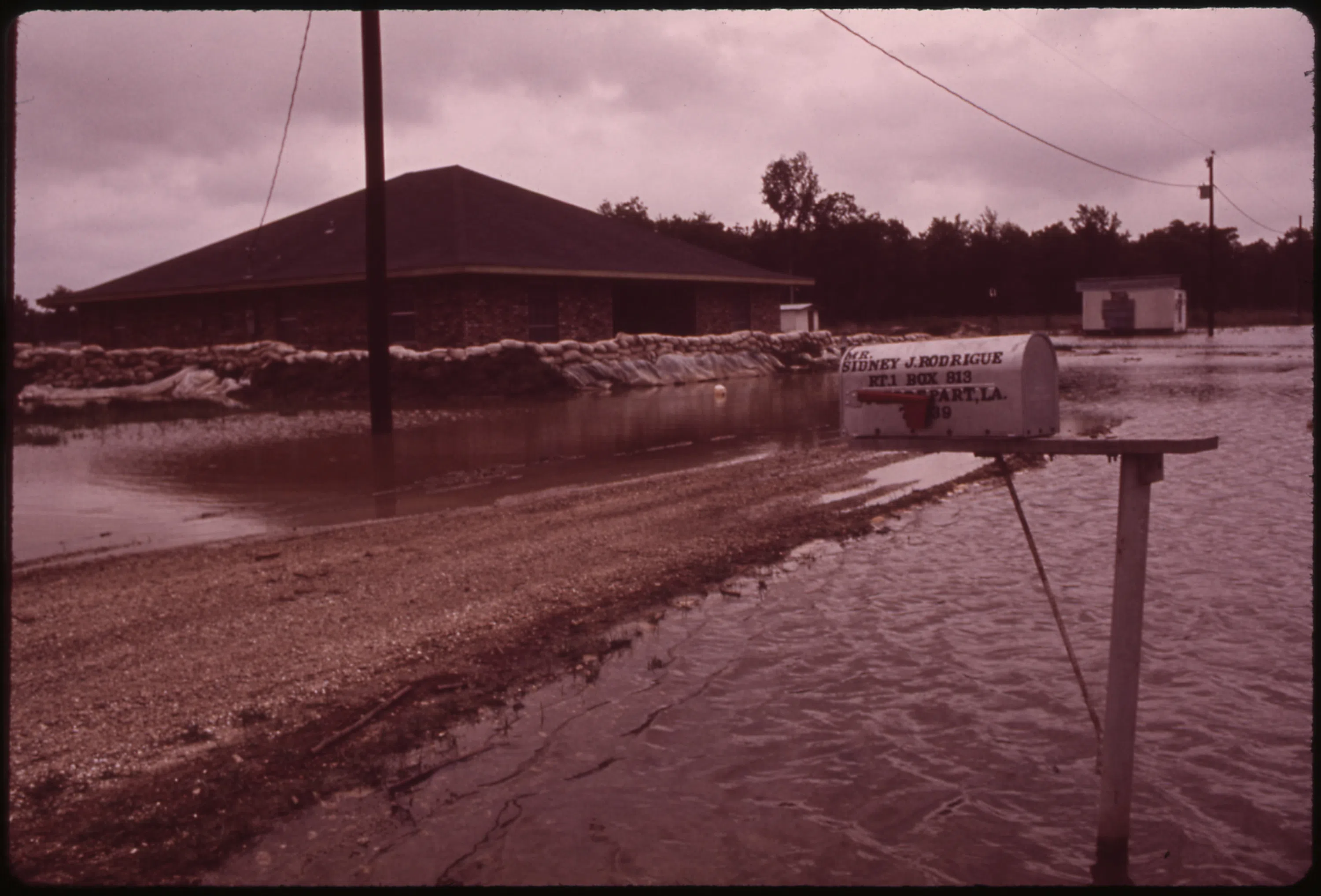 Flooded streets in Pierre Part during the spring 1973 Mississippi River flood