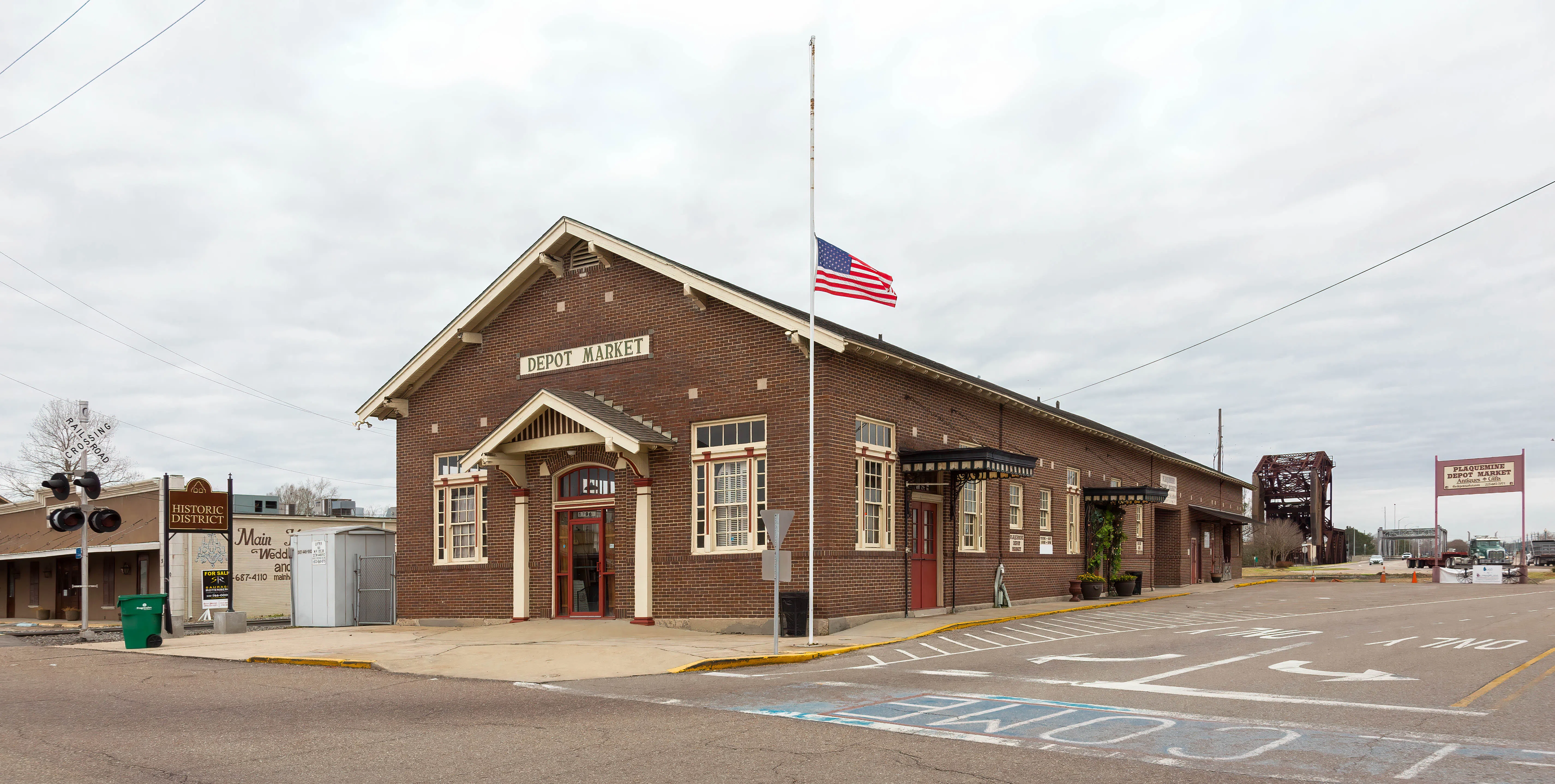 Depot Market in Plaquemine, with the rail bascule bridge behind the building
