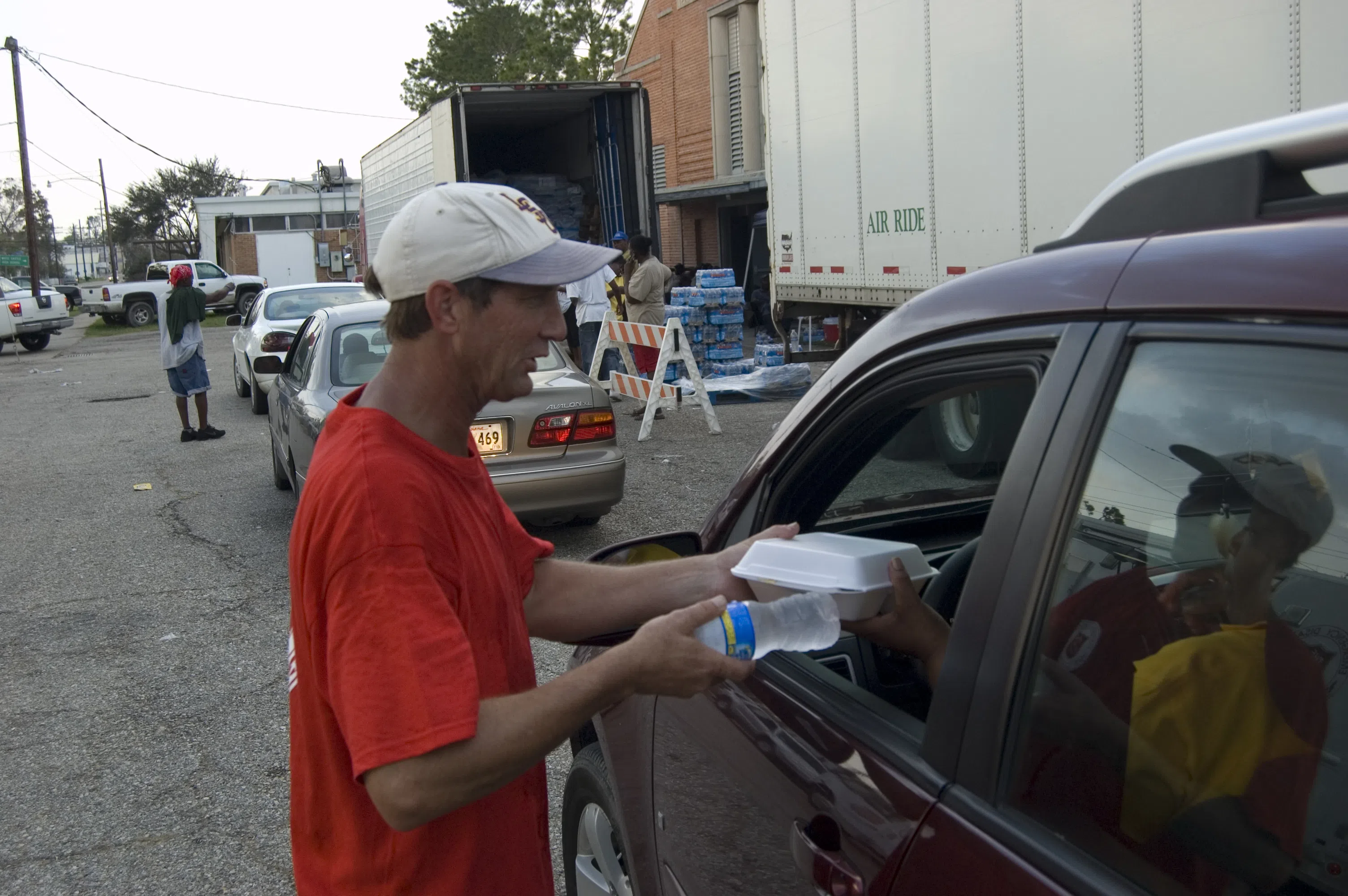 Salvation Army volunteer handing out food in White Castle, LA after Hurricane Gustav (2008)