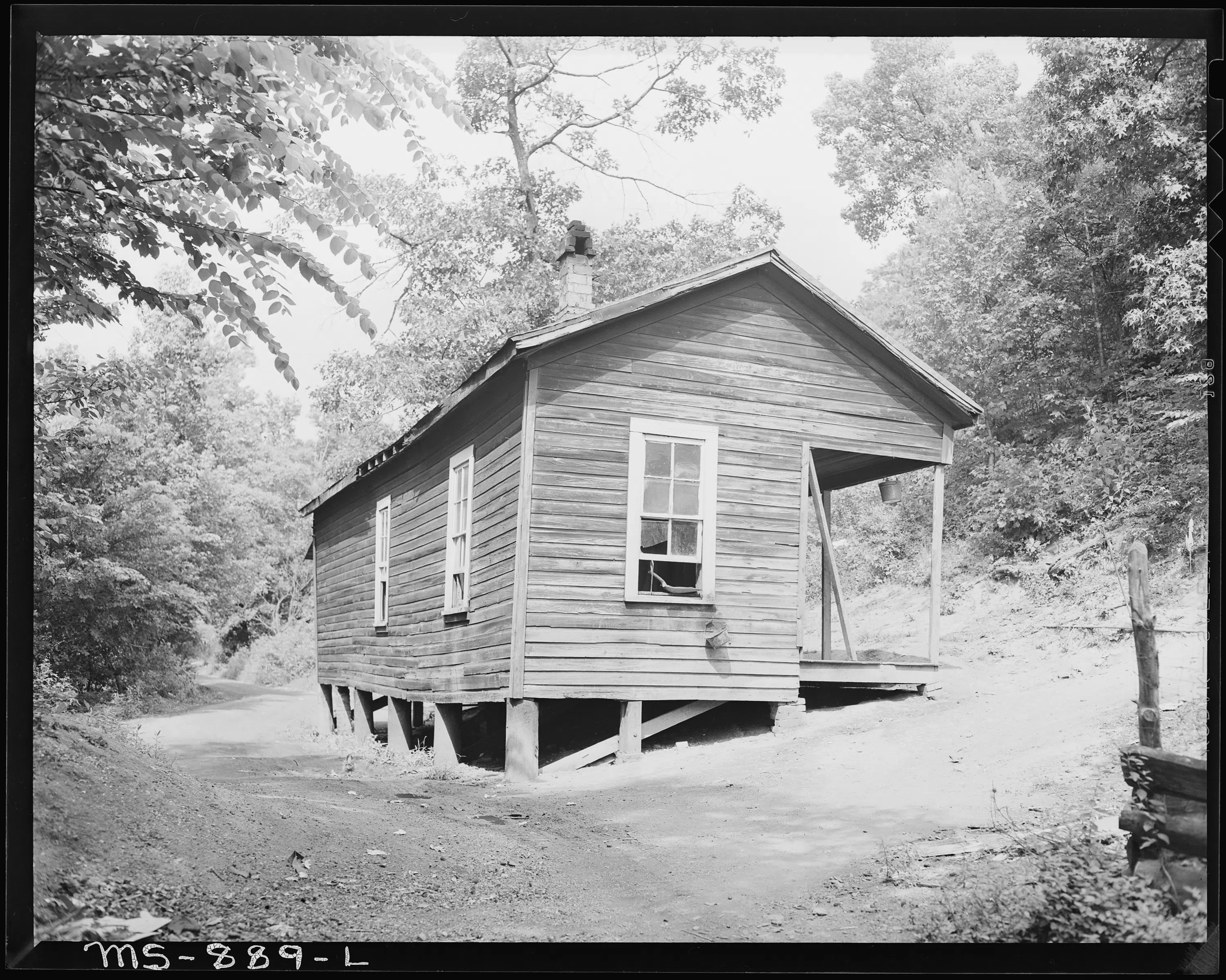 Home of Eddie Cain, miner, living in company housing project. Adams, Rowe & Norman Inc., Porter Mine, Adamsville - NARA - 540591