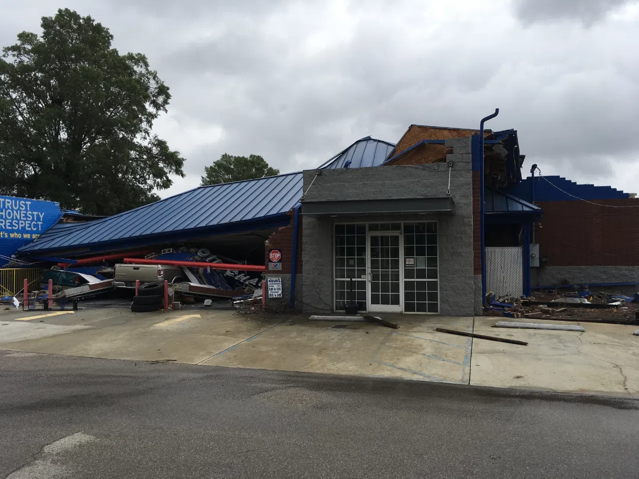 High-end EF1 tornado damage to an Express Oil Change in Fairfield, Alabama (June 2017)