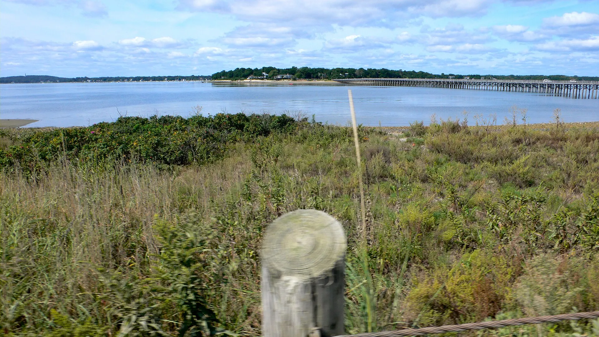 The protected bay side of the Duxbury Beach barrier, with the Powder Point Bridge and Powder Point homes beyond.