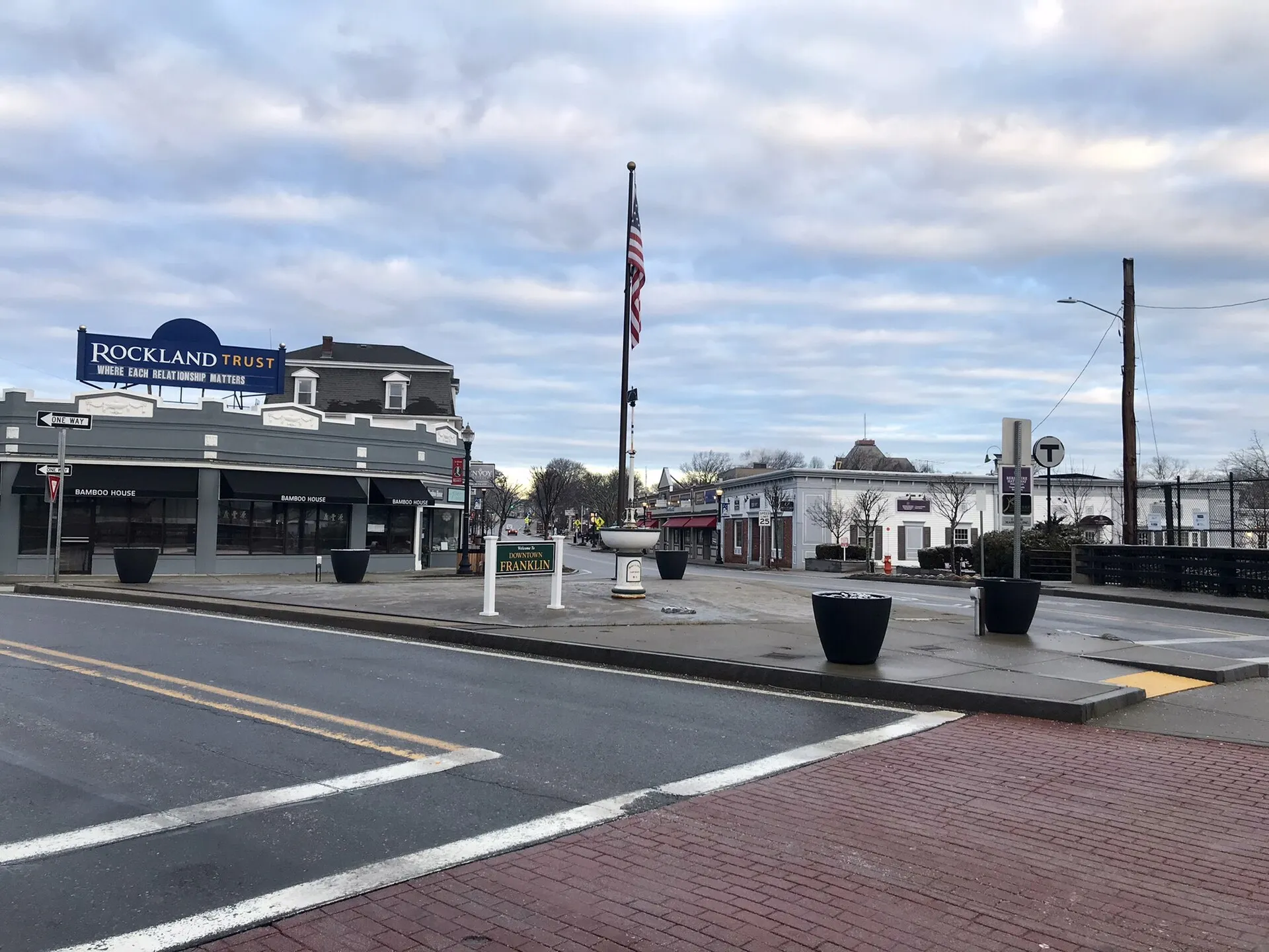 The town square at Franklin, Massachusetts located on the three-way bridge across the commuter rail tracks, in January 2023