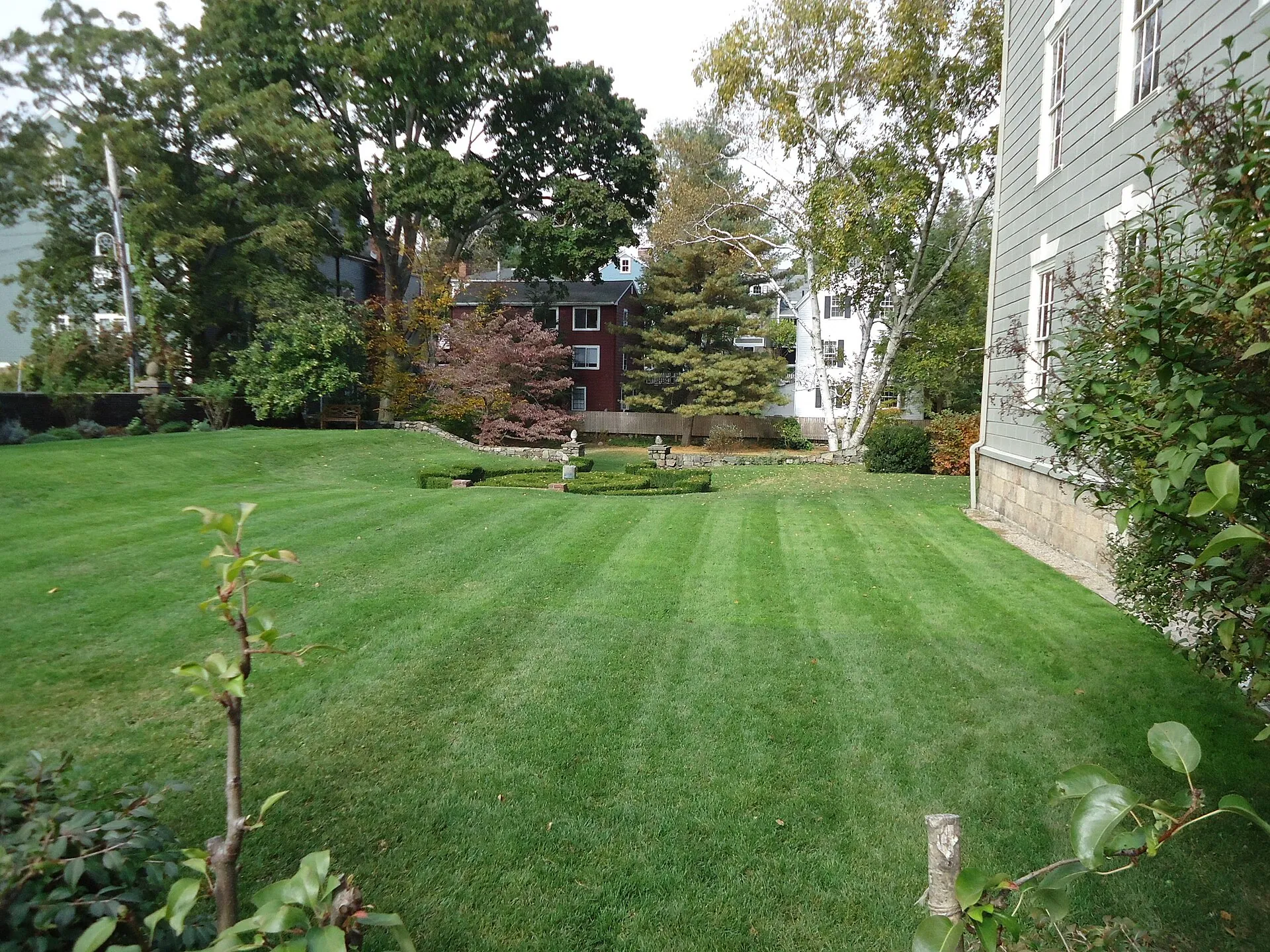 View of garden behind historical society building, in Marblehead Massachusetts, early autumn.