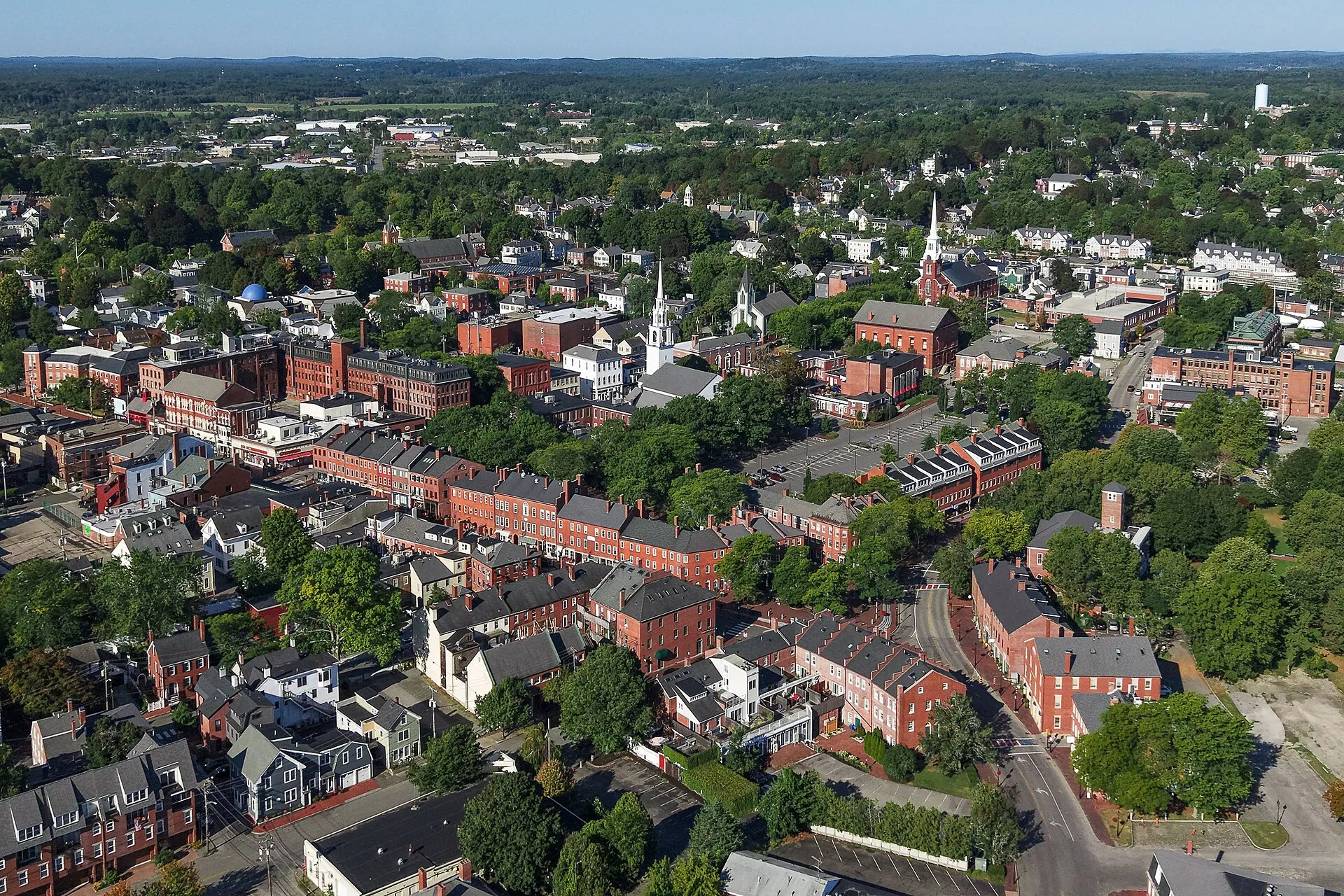 Aerial view of downtown Newburyport, Massachusetts, a city of 18,289 residents that developed as a major shipbuilding and maritime trade center and is now known for its preserved historic district and waterfront tourism.