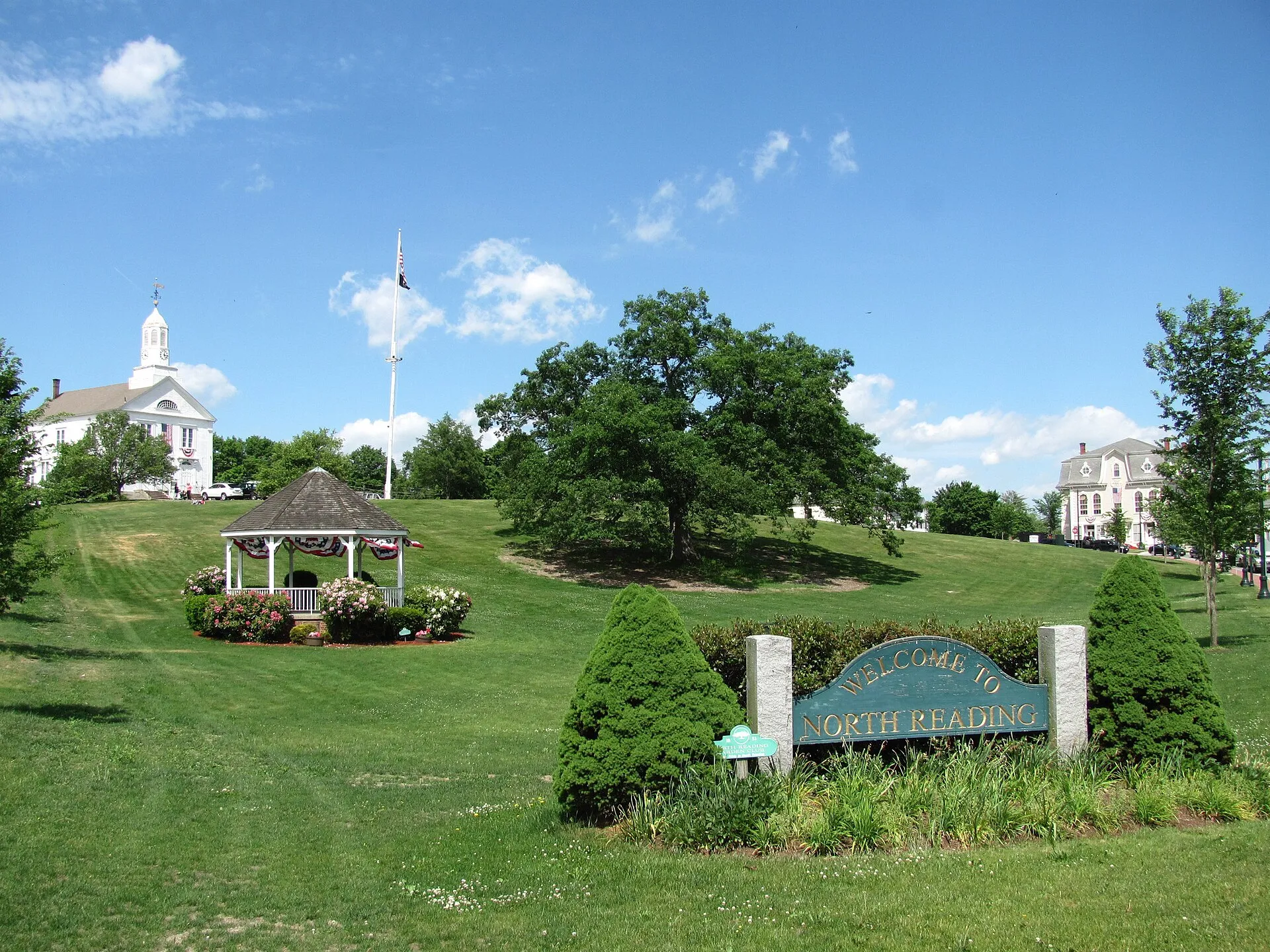 North Reading Common, North Reading Massachusetts - Third Meeting house is up the hill on the left, Flint Memorial Library is across the Common to the right.