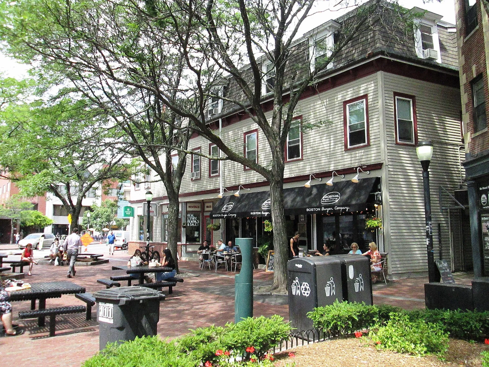 Davis Square is a major intersection in northwestern Somerville, Massachusetts where several streets meet: Holland, Dover, Day and Elm Streets, and Highland and College Avenues.  Thename also refers to the neighborhood surrounding the square.  The squar was given official status by Somervile in 1883, and is named after Person Davis, a grain dealer. The Davis stop on the MBTA Red Line services the square. Tufts University is nearby.