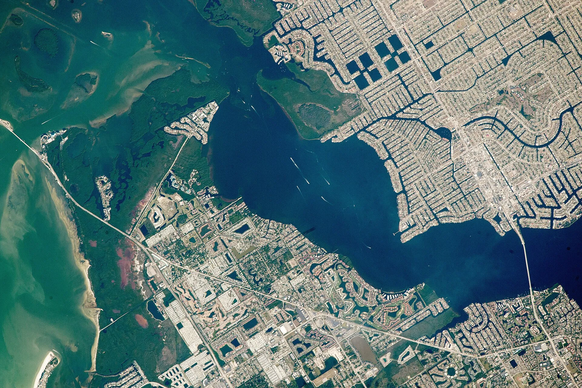 Astronaut photograph of Cape Coral's canal-grid master plan from the International Space Station.