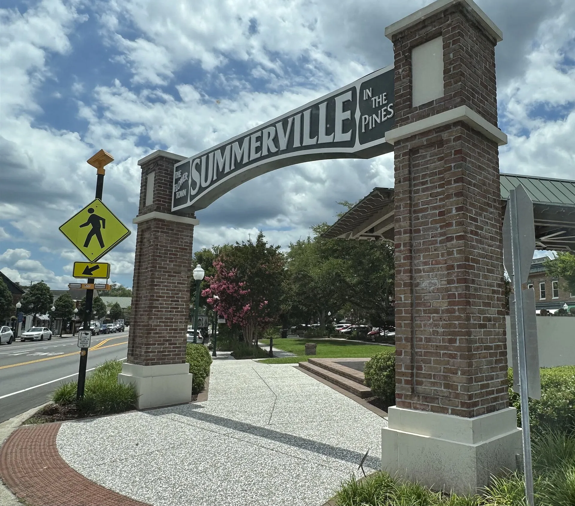 'Flower Town in the Pines' town entrance sign.