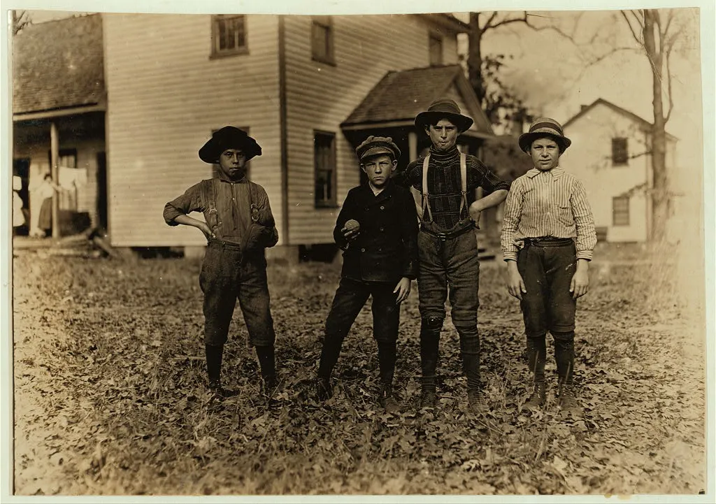Title: A Saturday ball game. Springstein Mills, Chester, S.C. Boy with glove, Malcom Rogers. (See photo 329). Next to him - Ben Deaton--12 years old. 52 inches high. Weaver. Runs 6 looms at $1.00...
