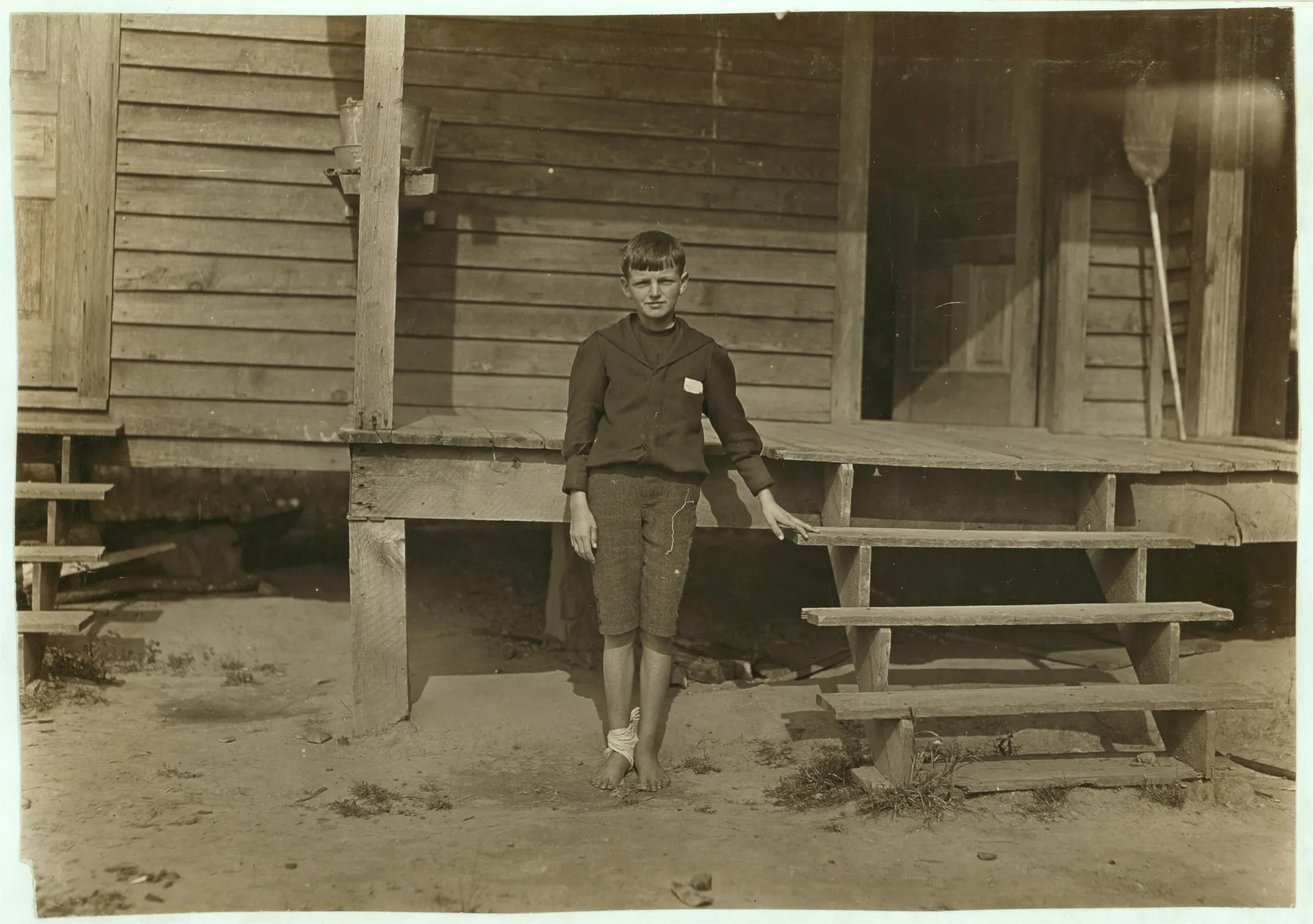 Title: 11 years old. Beginning to doff. Son of one of Gastonia's preachers . His two brothers, 14 and 16 years old, are also in the mill. Abstract: Photographs from the records of the National...