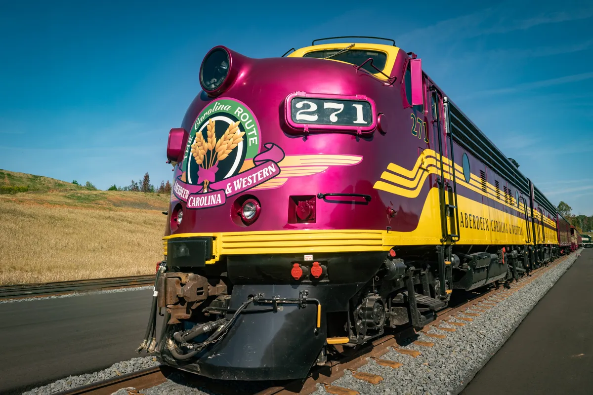 Aberdeen, Carolina and Western Railway 's EMD F9A diesel locomotive 271 with F9B 276 behind at Midland Logistics Park in Midland, North Carolina on October 11, 2022.
