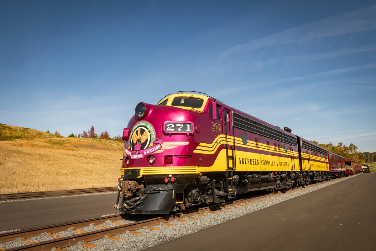 Aberdeen, Carolina and Western Railway 's EMD F9A diesel locomotive 271 with F9B 276 behind at Midland Logistics Park in Midland, North Carolina on October 11, 2022.