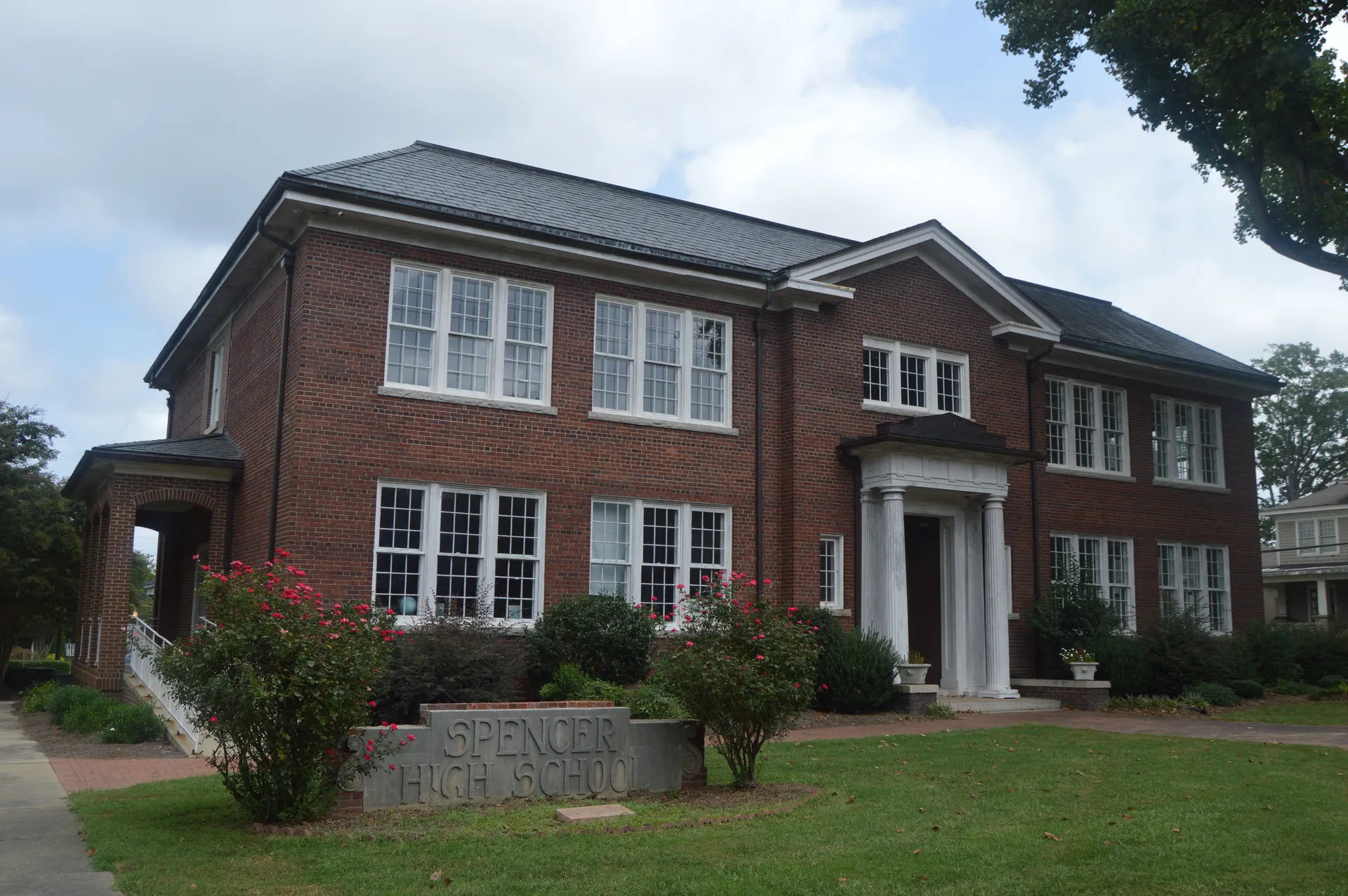 Western front of the former Spencer High School (now the town hall), located in the park bounded by Carolina Avenue, Third Street, Rowan Avenue, and Fourth Street in Spencer , North Carolina ,...