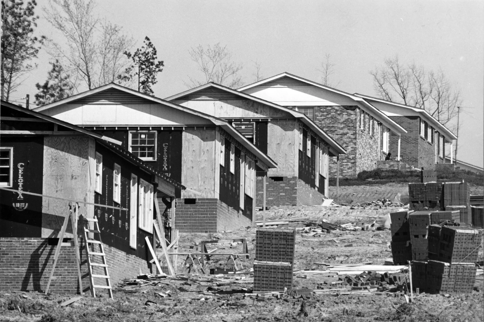Housing financed by U. S, Department of Agriculture's (USDA) Farmer's Home Administration (FHA) is shown under construction near Wadesboro, North Carolina in April 1970. Photo courtesy of National...