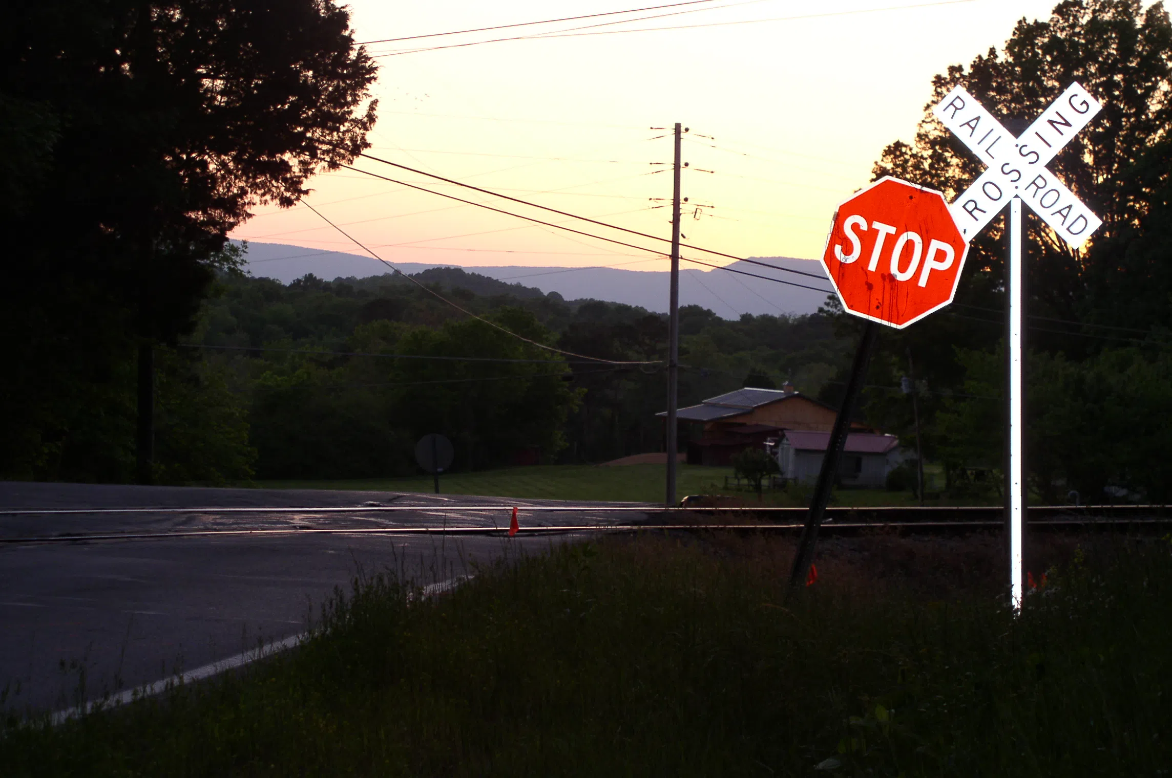 Chickamauga Railroad line crossing in Rock Spring, Georgia, with Lookout Mountain in the background.  — License: