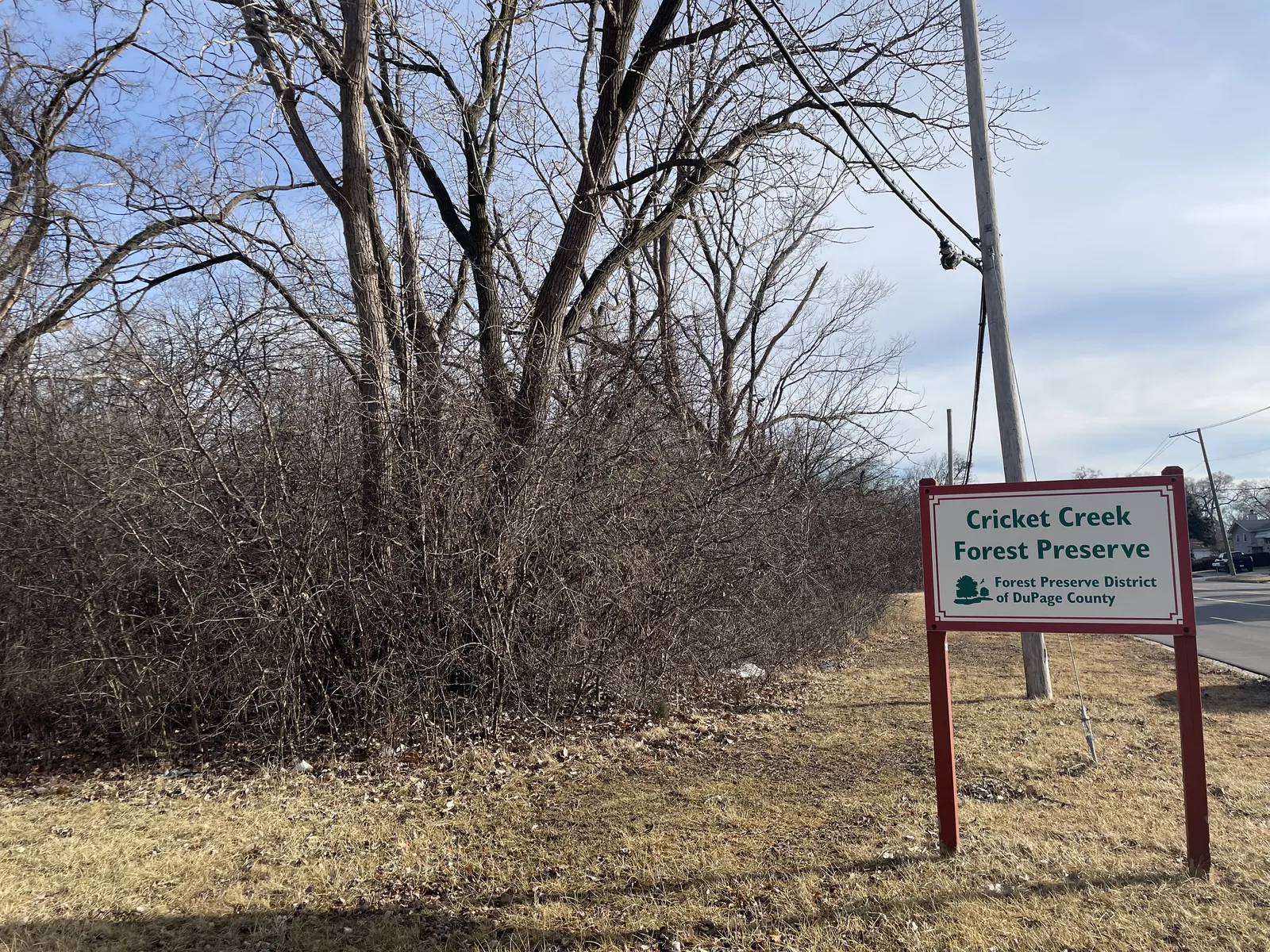 Sign on the edge of Cricket Creek Forest Preserve