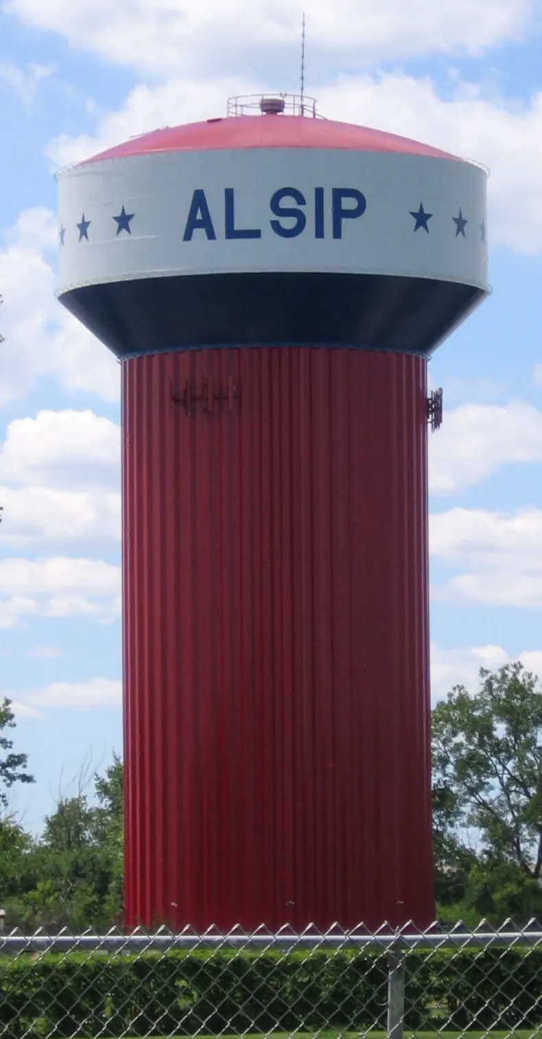 This is a photograph of one of the two municipal water towers for the village of Alsip, Illinois.  It is the water tower that is in the n..
