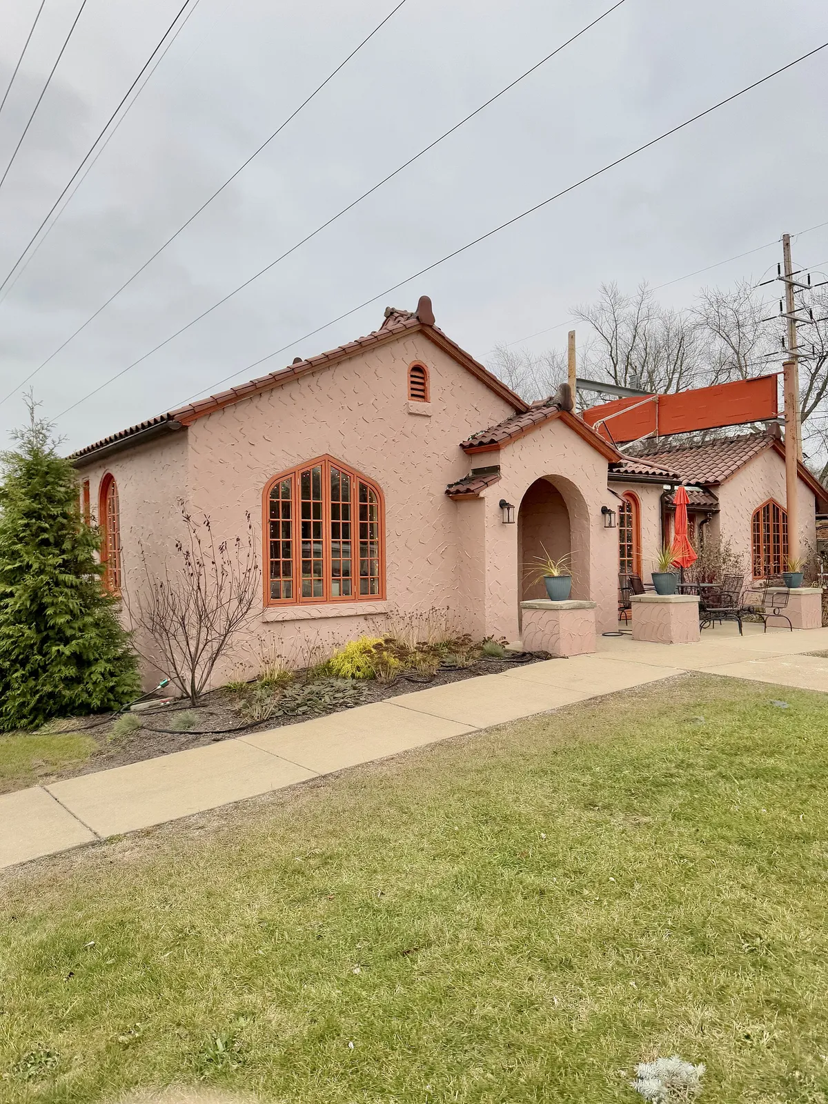 Built in 1929, this Spanish Colonial Revival-style building was designed by Arthur Gerber to serve as a passenger station on the South Shore Line for the town of Beverly Shores, Indiana, a resort community located southeast of Chicago along Lake Michigan. The building features a stucco-clad exterior