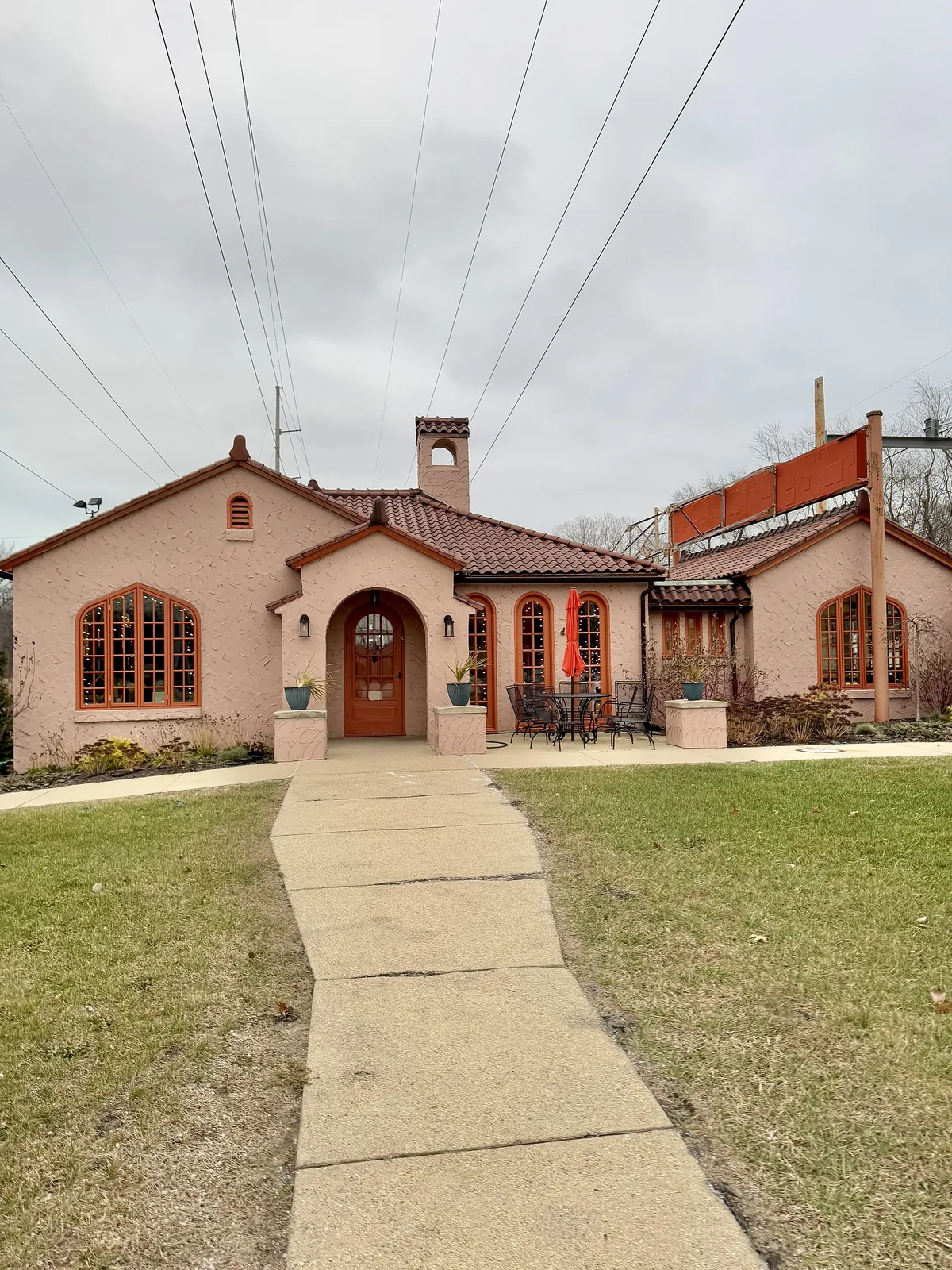 Built in 1929, this Spanish Colonial Revival-style building was designed by Arthur Gerber to serve as a passenger station on the South Shore Line for the town of Beverly Shores, Indiana, a resort community located southeast of Chicago along Lake Michigan. The building features a stucco-clad exterior