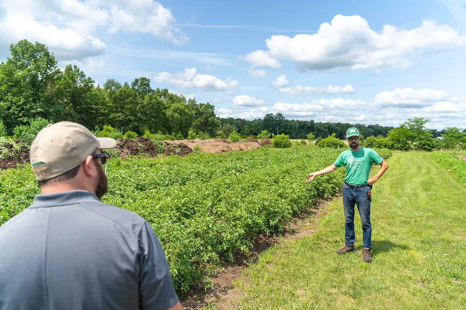 Kevin Shide (left), Indiana NRCS district conservationist for Jasper County, tours Perkins' Good Earth Farm with Dan Perkins July 2, 2021. Perkins’ Good Earth Farm is a certified organic farm and Dan and Julie Perkins practice regenerative agriculture including no-till and cover crops. They have enr