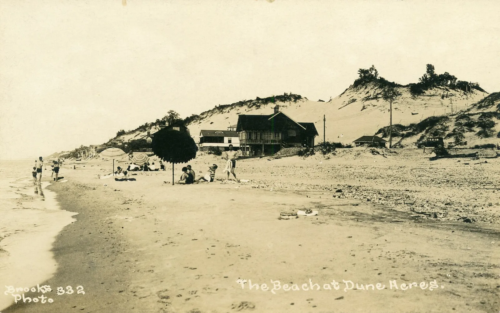 The Beach at Dune Acres. Date: Circa 1925 Source Type: Postcard Publisher, Printer, Photographer: Brooks (#332) Postmark: None Collection: Steven R. Shook Remark: Dune Acres was founded in 1923 and is located west of Porter Beach (Porter Beach is also known as Johnson's Beach and Waverly Beach). Cop