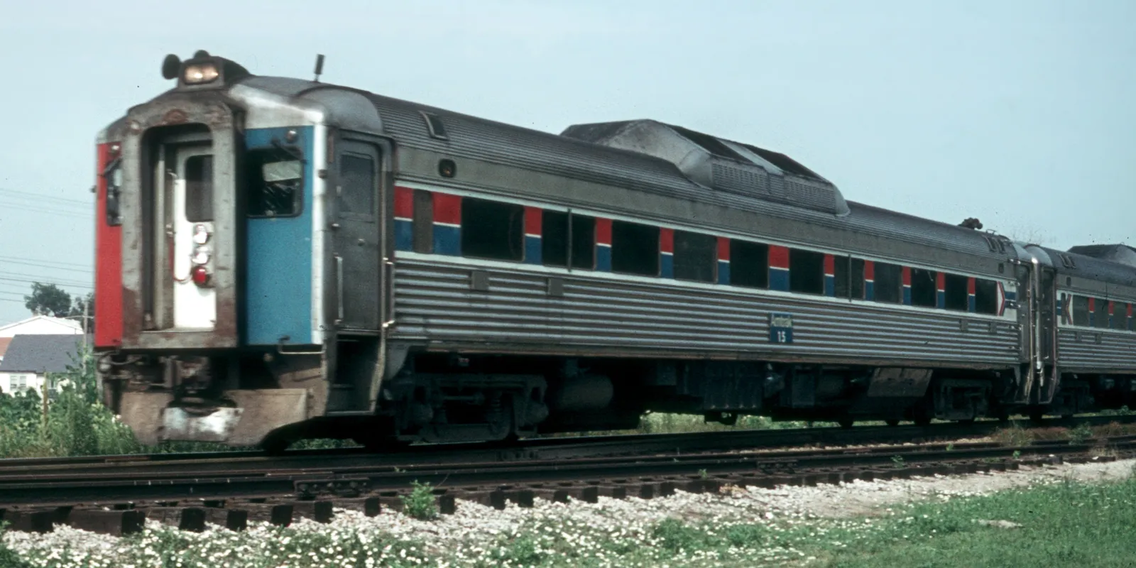 Amtrak Budd RDC No. 15 with the Black Hawk passing through Hillside, July 23, 1975