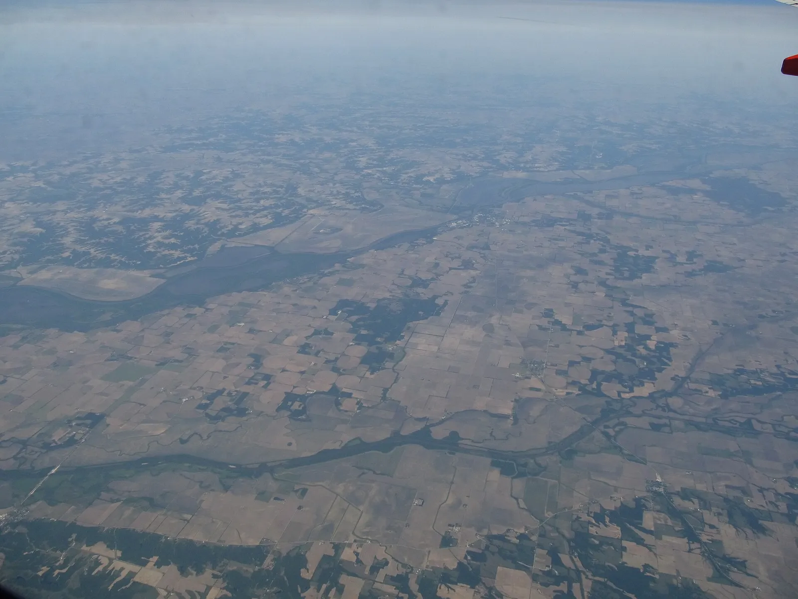 The Illinois River is a principal tributary of the Mississippi River, approximately 273 miles (439 km) long, in the State of Illinois. The river drains a large section of central Illinois, with a drainage basin of 28,070