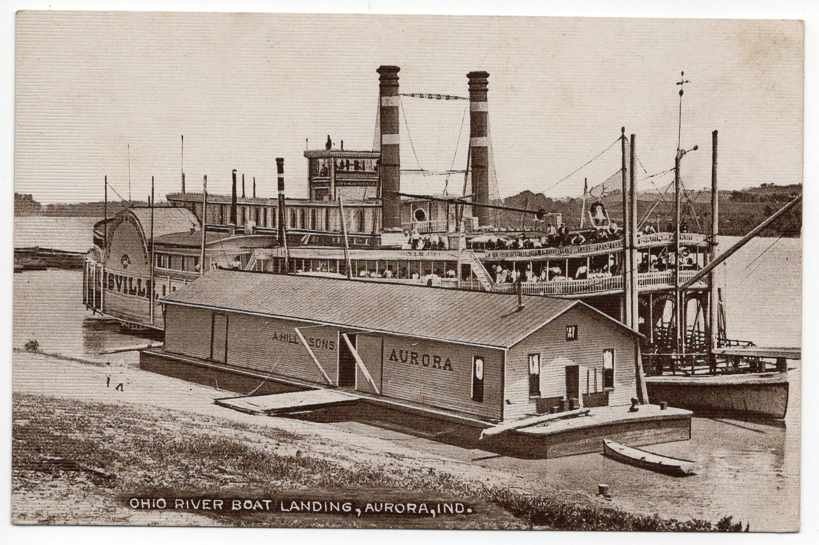 Unsent postcard showing the wharf boat ("a boat moored and used for a wharf at a bank of a river or in a like situation where the height of the water is so variable that a fixed wharf is impracticable") at https://en.wik