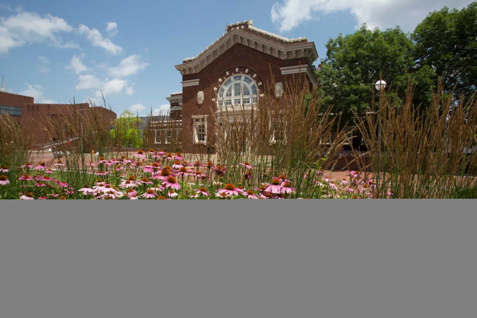 A summertime photo of the Dieterle Vocal Arts Center at the University of Cincinnati College-Conservatory of Music (CCM).