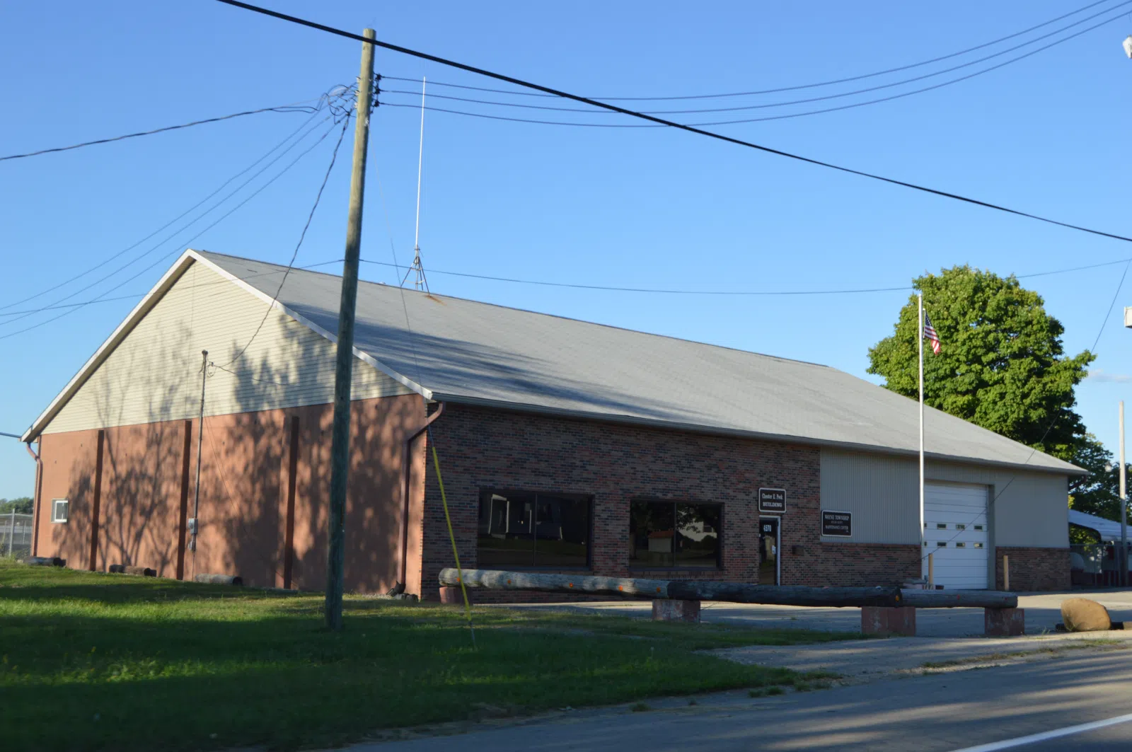 Front and western side of the Wayne Township road maintenance building, located on the northern side of State Route 744 just west of the Jacksonburg Road intersection in Jacksonburg, Ohio, United States.
