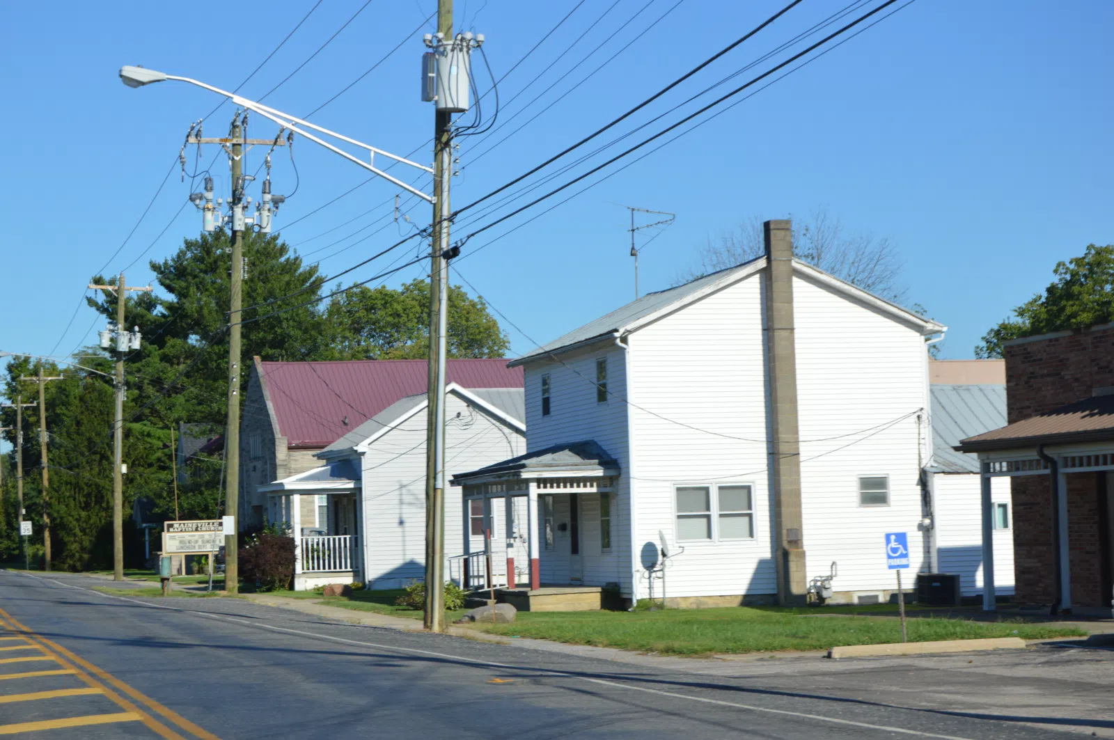 Looking east from State Route 48 toward buildings on the southern side of Maineville Road in central Maineville, Ohio, United States.
